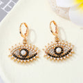 Gold Tone Ornate Crystal Evil Eye Huggie Drop Earrings in Seven Designs view 11
