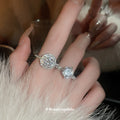 Two Silver Tone Solitaire Rings In Round Halo Or Oval Crossover Styles view 1