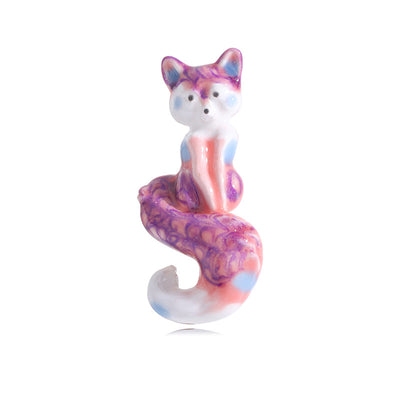 Front view of the colorful sitting fox enamel brooch in four variations brooch and its color options