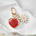 Gold Tone Daisy and Pressed Flower Heart Snap-Hook Keychains in Ten Options view 9