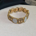 Oval Cross Coin Stretch Bracelet Gold Silver Glitter Medallions view 6