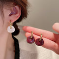 Burgundy Enamel Curved Drop Earrings with Gold Tone Hooks view 1