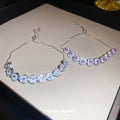 Silver Tone Heart Crystal Slider Bracelets In Pink Or Clear view 2