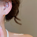 Crystal Bar and Chain Tassel Drop Earrings in Polished Gold Tone view 3