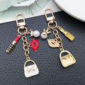White Pink Red and Black Fashion Charm Keychains with Metal Hardware view 3