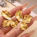 Hammered Three-Petal Flower Stud Earrings Shell Bead Center view 1
