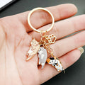Three-Cat Calico Orange and Blue Enamel Paw Print Charm Keychain view 2
