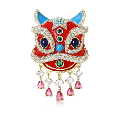 Colorful Lion Dance Mask Brooch With Crystal Dangles shown from the front on a white background