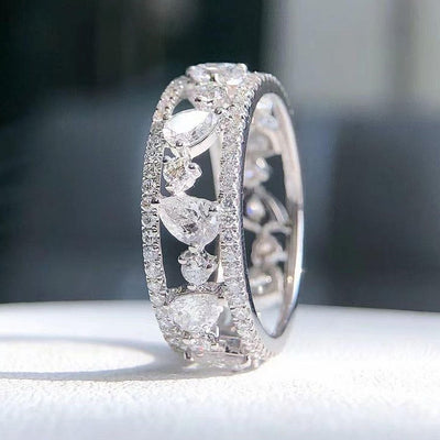 Open Heart and Round Stone Eternity Style Band Ring shown in product close-up