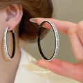 Black Hoop Earrings with White and Black Lettered Edges view 4