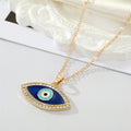 Gold Tone Crystal Halo Navy Evil Eye Pendant Necklace view 3