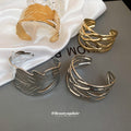 Two Wide Open Leaf Cuff Designs In Gold Or Silver Tone view 3