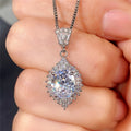 Oval Halo Pendant with Green Red or Clear Stone with Clear Stone Details view 3