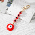 Evil Eye Bead Strand and Round Pendant Clip Keychains in Five Colors view 3