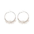 Gold Tone Hoop Earrings With White Floral and Pearl Like Accents view 5