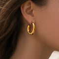 Irregular Rounded C Hoop Earrings in Polished Gold Tone view 4