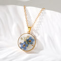 Round Pressed Blue Flower Resin Necklace and Earring Options view 3