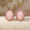 Pink Oval Cabochon Look Crystal Halo Stud Earrings view 1