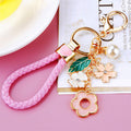 Pink Five-Petal Flower Keychains with Optional Braided Wrist Loop view 1