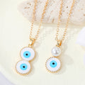 Gold Tone White Evil Eye Pendant Necklaces in Two Drop Designs view 1