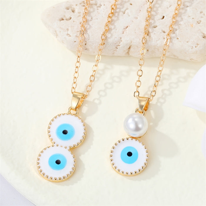 Gold Tone White Evil Eye Pendant Necklaces in Two Drop Designs