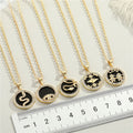Gold Tone Round Crystal Framed Motif Pendant Necklaces in Nine Designs view 4