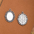 Ornate Oval Cabochon Pendant Setting in Three Finishes view 4