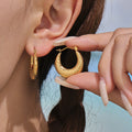 Scaled Teardrop Hoop Earrings in Gold and Silver Tone view 2