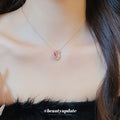 Red Crystal Swan Pendant Necklace in Rose Gold Tone view 4
