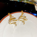 Spiral Christmas Tree Star Drop Stud Earrings With Decorative Metal Details view 6