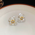 White Petal Flower Stud Earrings with Gold Tone Centers view 6