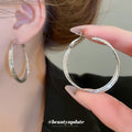 Double Layer Textured Hoop Earrings in Gold with Polished Details view 4