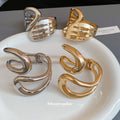 Two Open Geometric Cuff Designs In Gold Or Silver Tone view 1