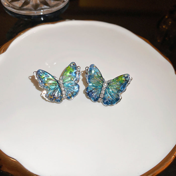 Blue Green Crystal Butterfly Stud Earrings With Polished Metal Tone Details