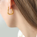Gold Steel Irregular Teardrop Organic Open Hoop Earrings view 1