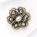 Pearl and Crystal Floral Brooch with Polished Metal and Decorative Accents view 4
