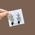 Silver Sculptural Flower Black Teardrop Dangle Earrings view 4