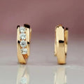 Gold Tone Four Stone Cross Band Huggie Hoop Earrings view 2
