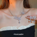 Silver Crystal Flower Necklace and Drop Earrings Pieces view 2