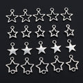 Small Star Charms in Four Distinct Open and Solid Shapes view 1