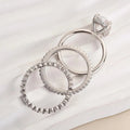 Oval Solitaire Three-Ring Stack In Gold And Silver Tone Finishes view 3