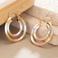 Gold Tone Triple Hoop Earrings With White And Pink Bands view 2