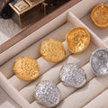 Embossed Flower Oval Stud Earrings Gold Or Steel Finish view 2