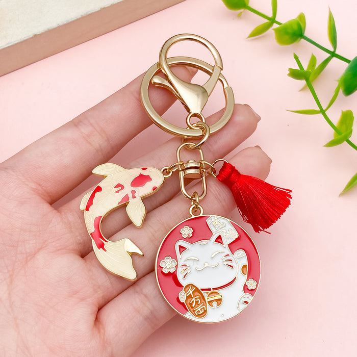 Cat Charm Keychains Featuring Red Cat Across 17 Pictured Variations
