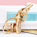 Gold Tone Revolver Keychain with Clear Crystal Grip Panels view 2