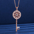 Ornate Key Pendant Necklace in Two Metal Tones With Polished Clear Stone Detail view 1
