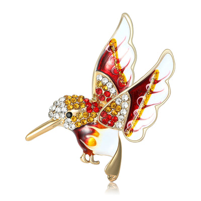 Crystal and Enamel Hummingbird Brooch shown against a white display background