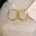 Classic Rounded Hoop Earrings in Three Sizes and Two Tones view 7