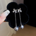 Crystal Bow Chain Earrings With Pearl Drops in Three Colors view 6