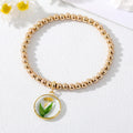 Gold Tone Beaded Clear Resin Pressed Flower Charm Bracelets view 3